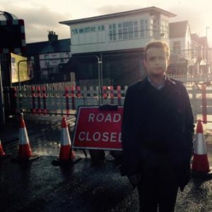 Josh Mason pictured at the level crossing